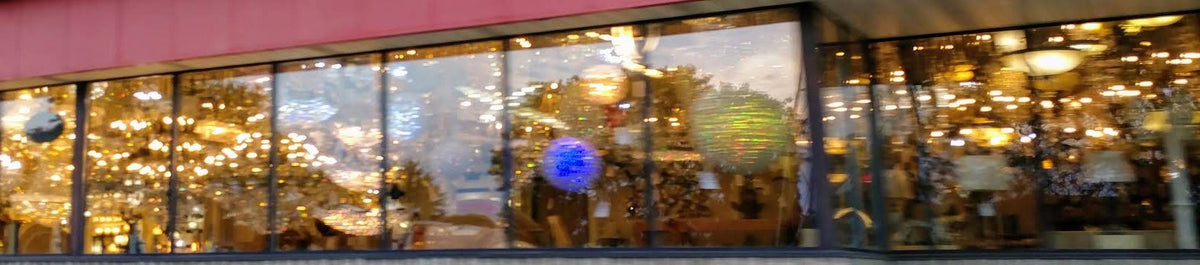 Chandeliers lit up in the front windows of Excel’s Warren branch on 8 Mile Road